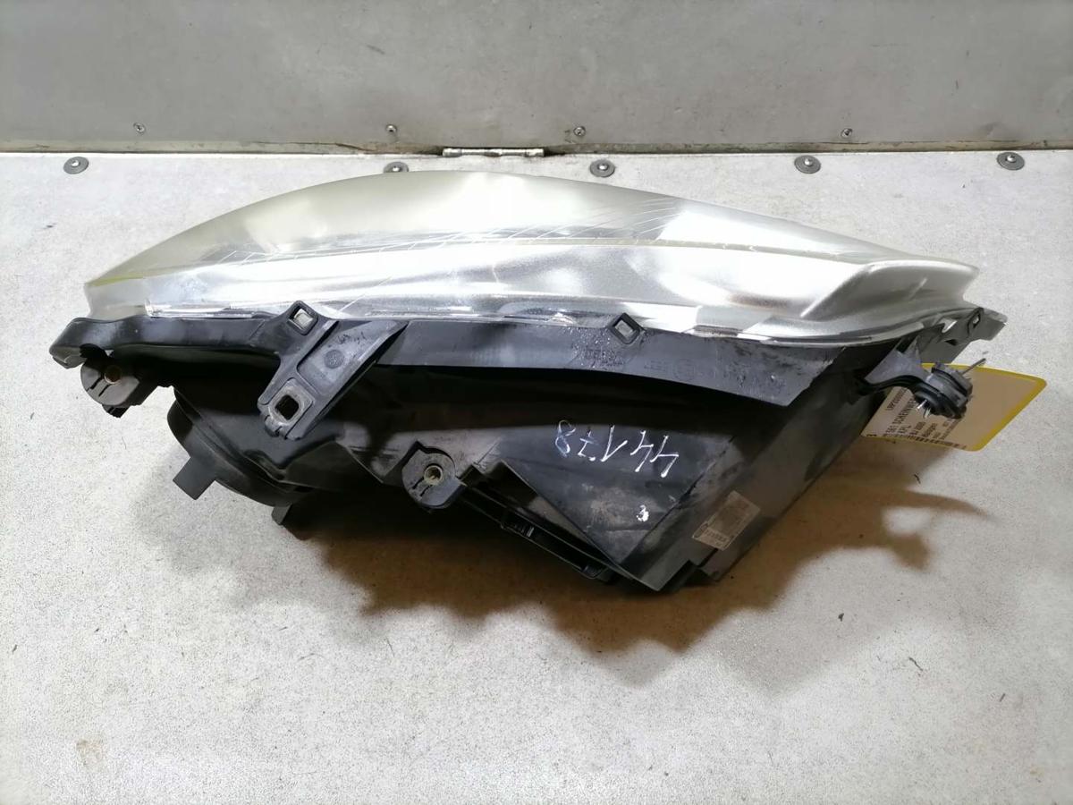 VW Polo 9N3 original Scheinwerfer vorn links Halogen oberhalb leicht vegilbt Bj.2005 VW Polo 9N3 original Scheinwerfer vorn links Halogen oberhalb leicht vegilbt Bj.2005